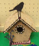 [Jill Moe Birdhouse with Bird image]